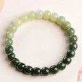 Hetian Jade Water Gradient Bracelet with polished oval beads in clear water colour.