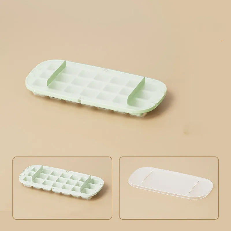 Blue food-grade plastic ice cube tray with grid design and integrated ice shovel storage.