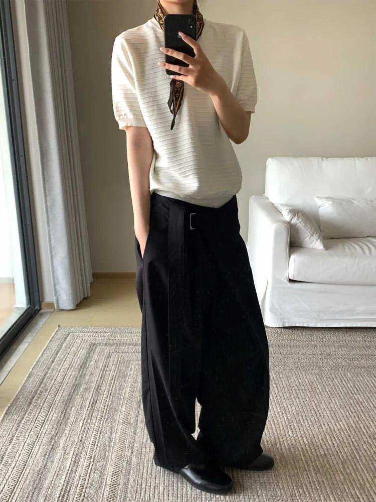 Black straight-leg trousers with adjustable waistband and single pleat front detail