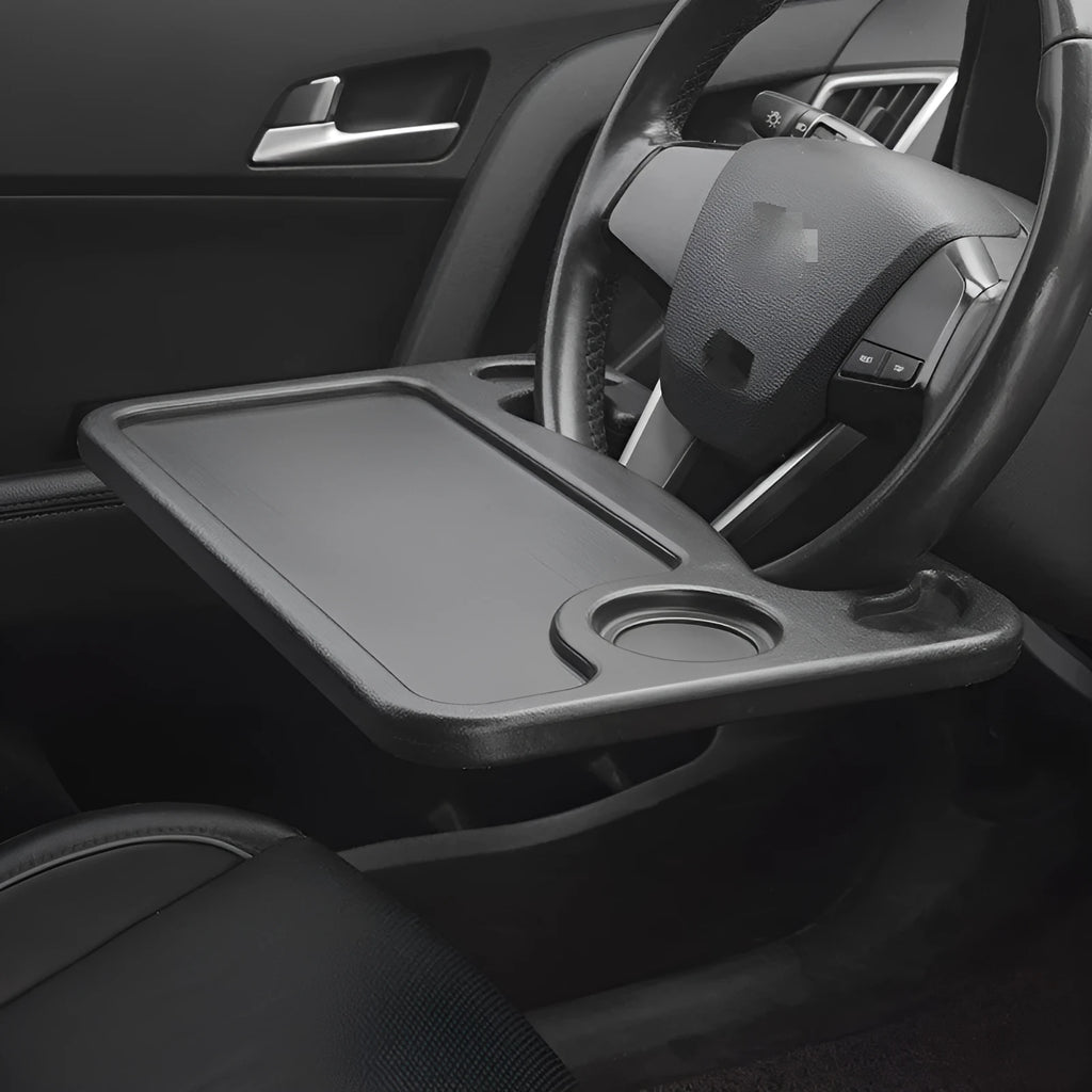 Black plastic car tray desk measuring 42cm by 28cm on a car seat