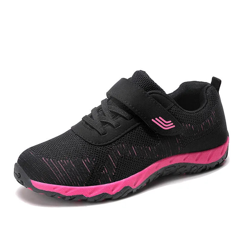 Women's low-top wedge sneaker in grey purple with mesh upper and Velcro strap.