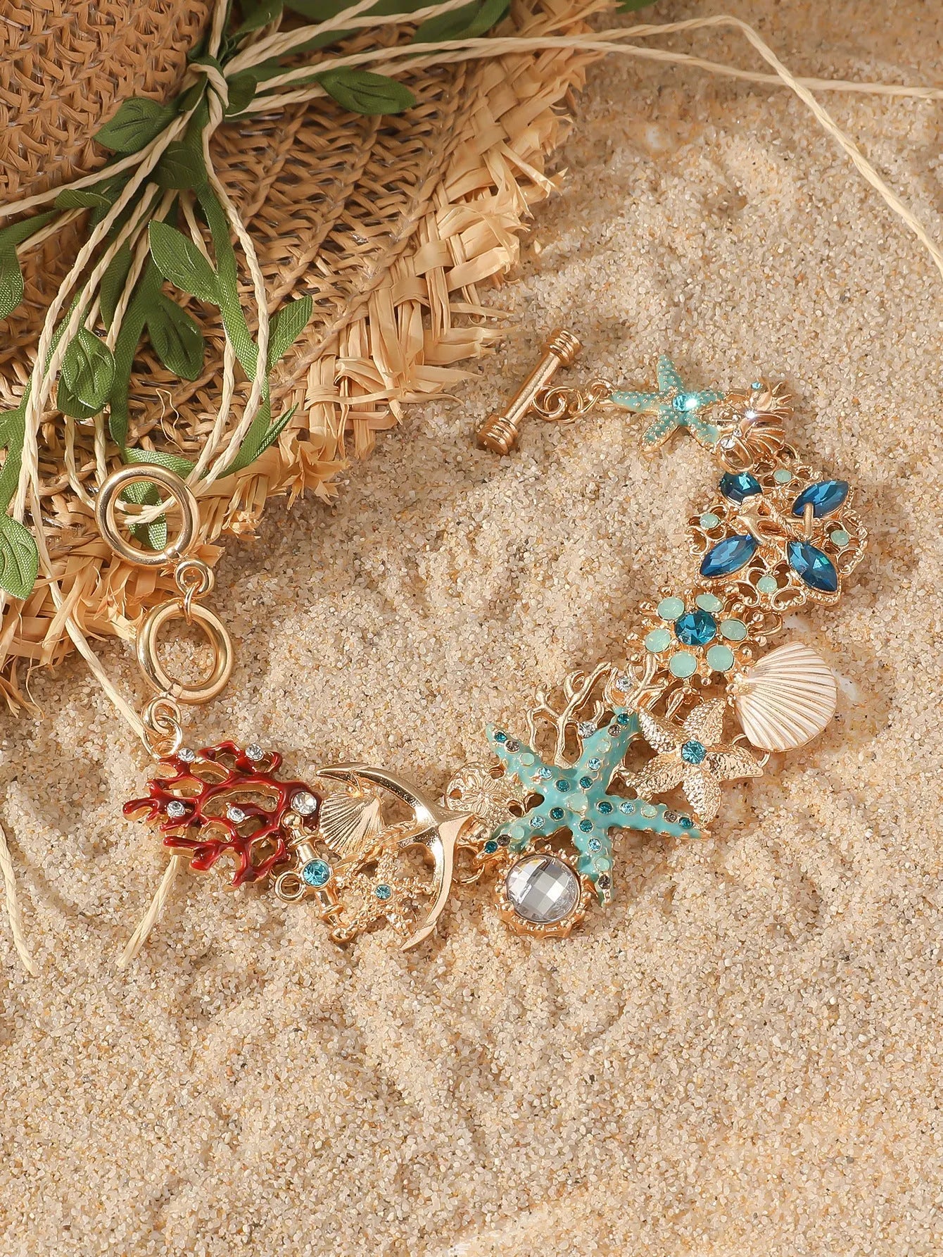 Women's marine boat anchor and starfish alloy bracelet in turquoise, coral red or coral blue colour
