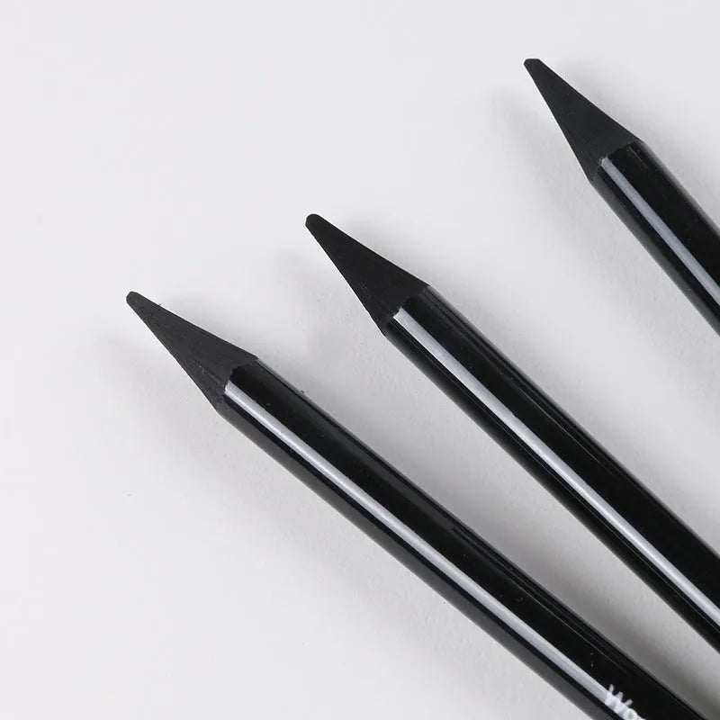 Carbonized Pencil Suit set showing graphite and carbonized pencils with wooden shells on a suction card.