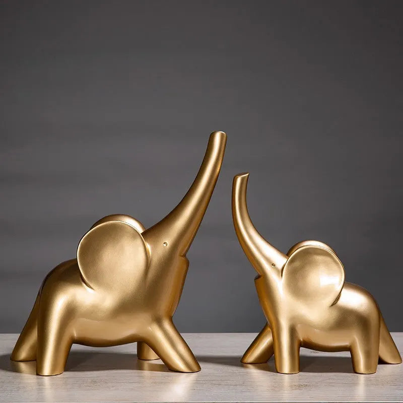 Modern resin elephant ornament in rose gold or white finish, available in large and small sizes
