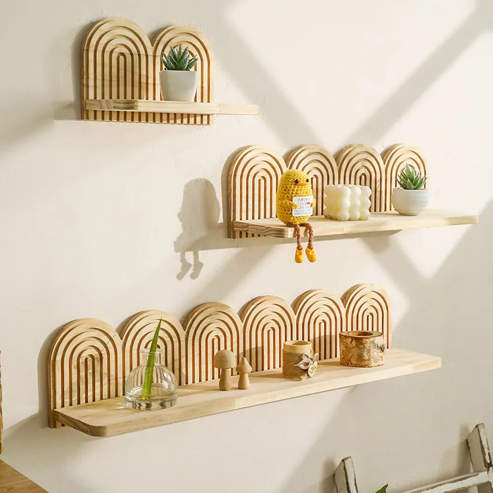 Wooden multi-layer wall rack displaying potted plants in home setting