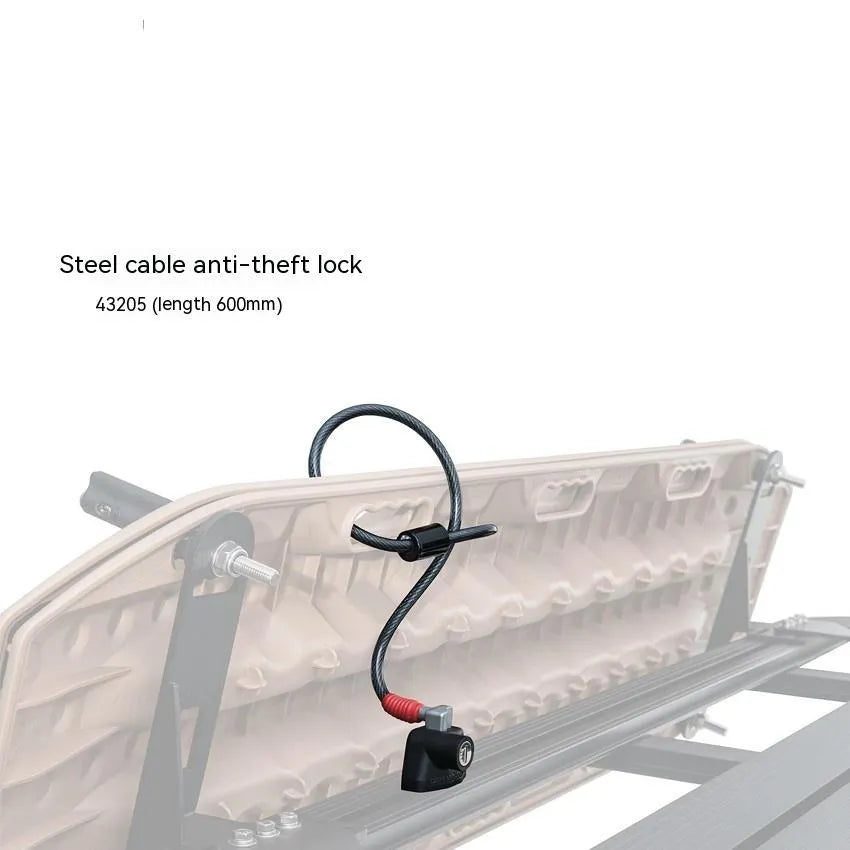 Plastic-sheathed steel cable lock for securing kayak to a vehicle roof rack without drilling.