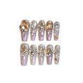 False nail patches with rhinestone decoration on card paper packaging with application tools