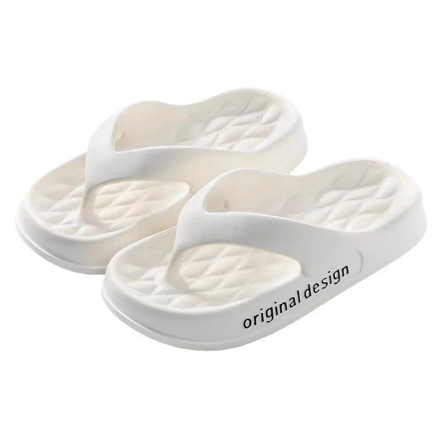Men's EVA flip flops on a beach, showing open-toe design and injection moulded sole in a choice of colours.