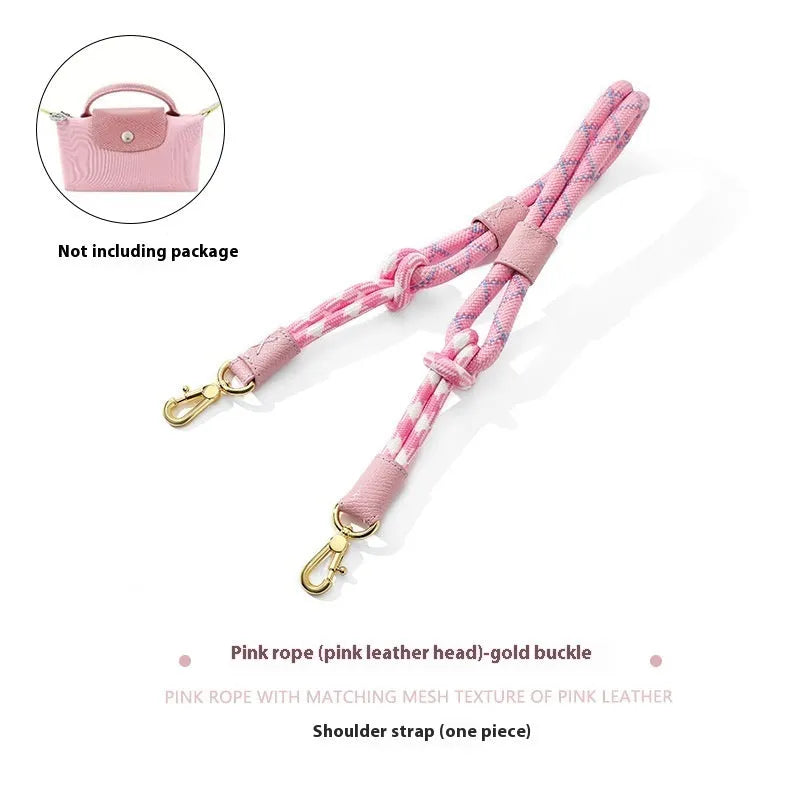 Braided nylon and cowhide leather crossbody shoulder strap with gold alloy buckle on a grey background.