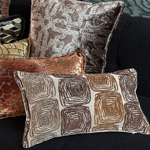 Abstract coil pattern pillow cover in cream and coffee colours showing square and rectangular size options