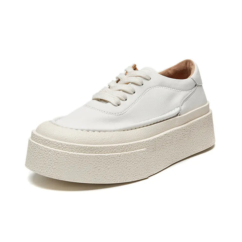 Women's black platform casual sports shoes with embossed cowhide upper and round toe design