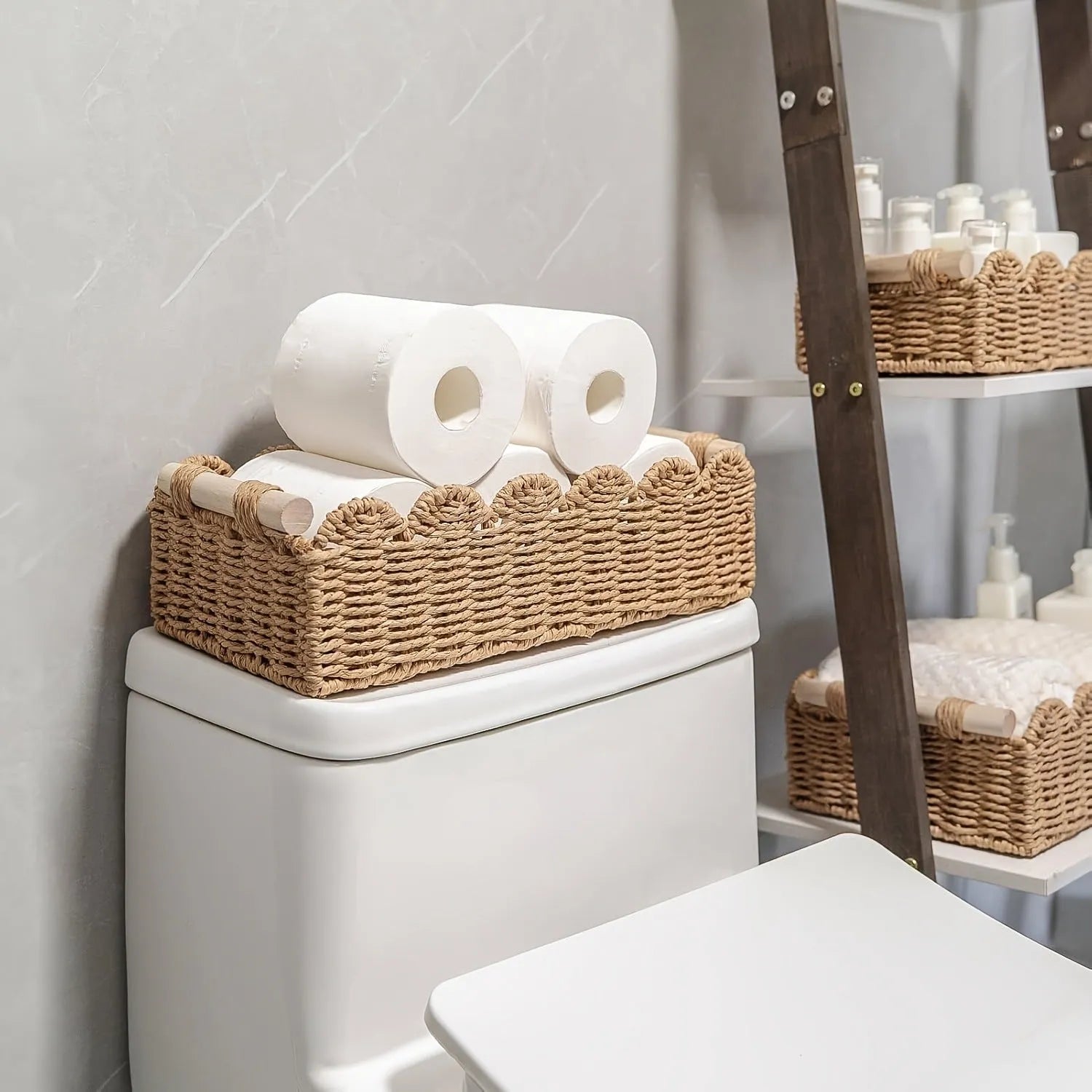 Rectangular woven paper storage basket in a choice of colours on a wooden table.