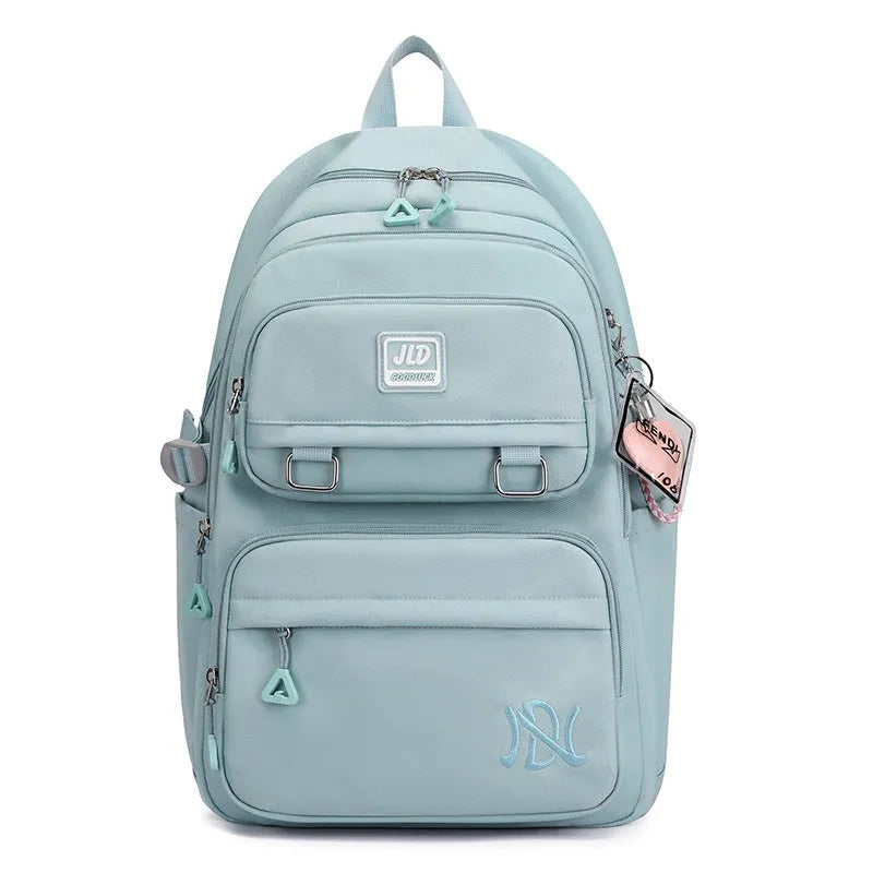 Girls' large capacity waterproof school backpack with physiological curve backplane in multiple colour and pattern options