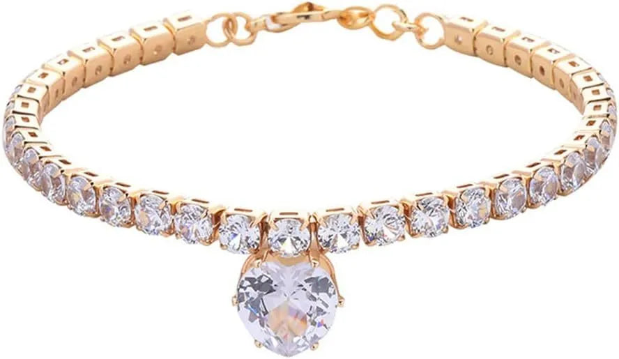 Gold rhinestone heart design pet collar for cats and dogs on a white background.