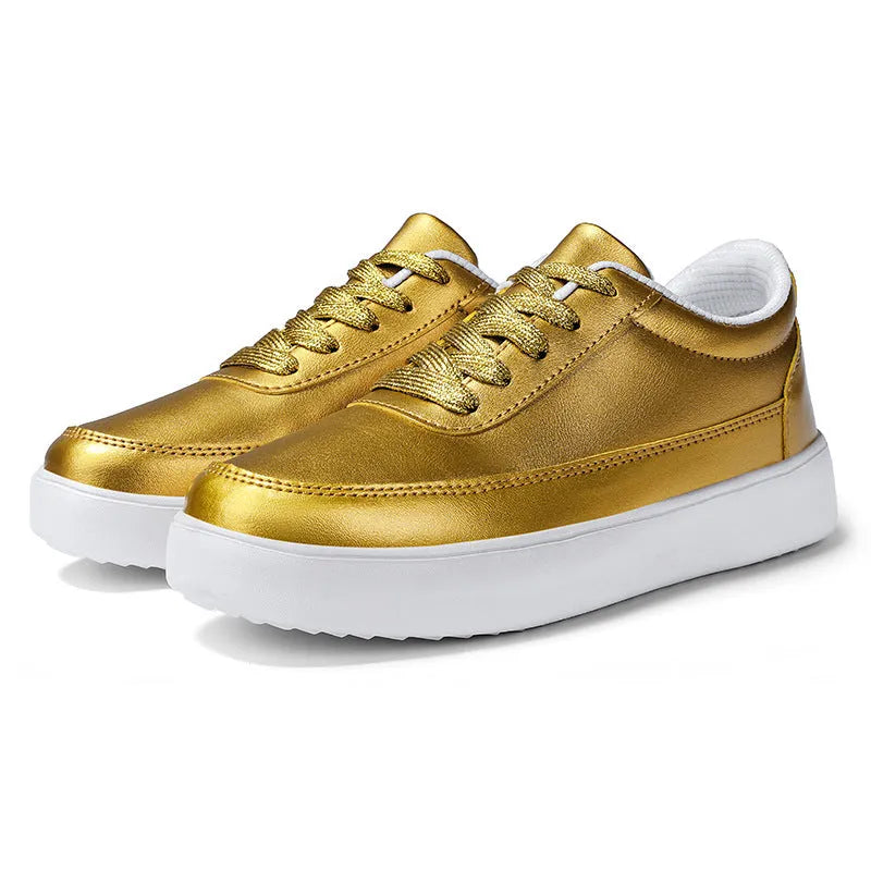 Women's white leather flat casual shoes with front lace-up closure.