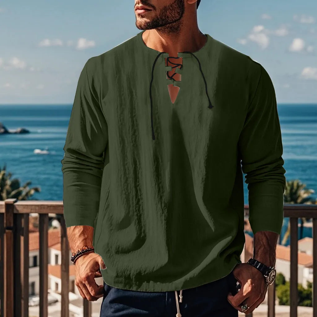 A man wearing a loose-fit solid colour cotton linen blend casual shirt.