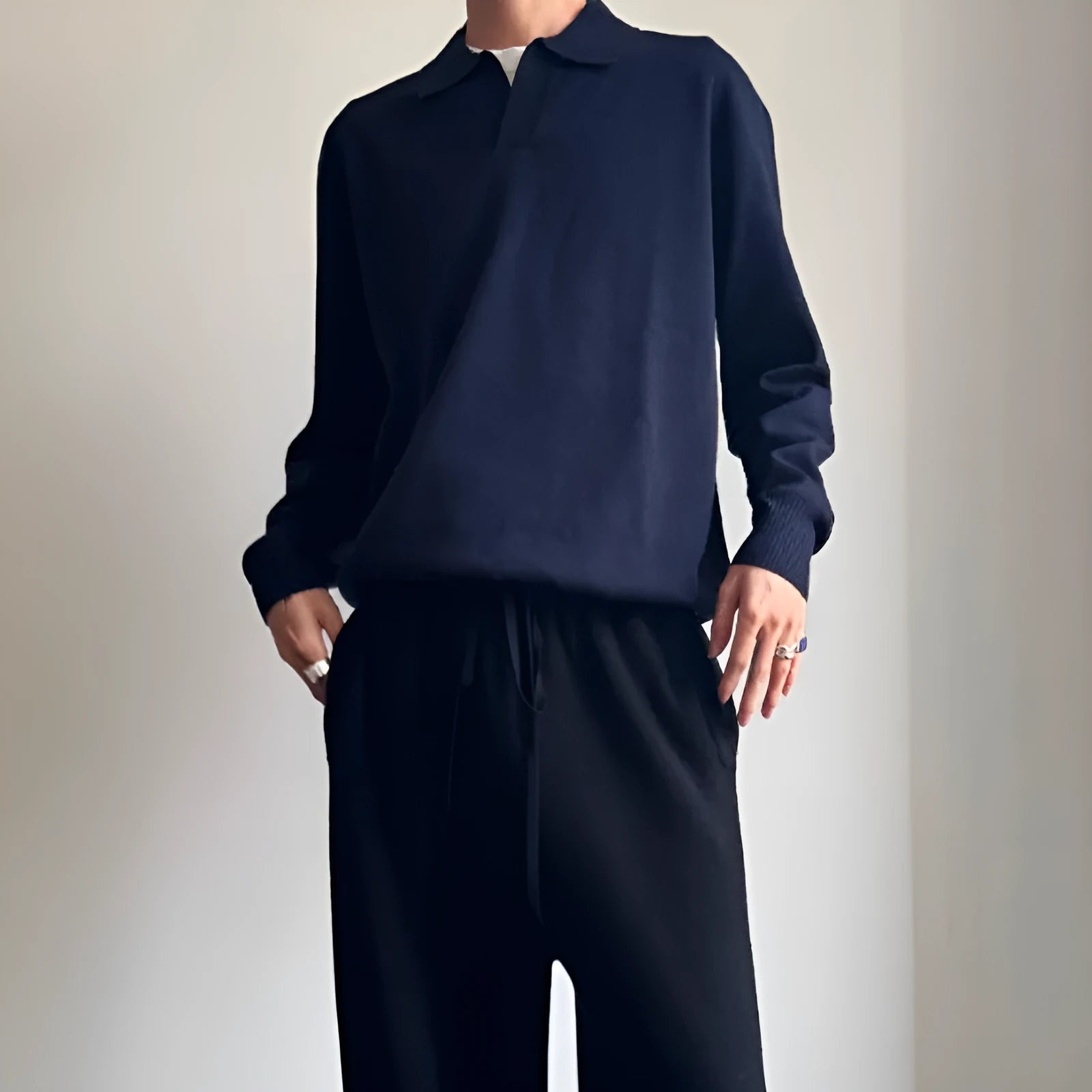 Men's pure wool polo sweater with lapel collar in loose fit, shown in milky white and navy blue colours