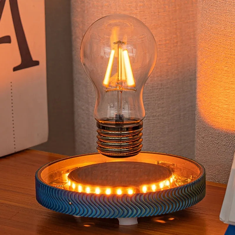 Magnetic suspension moon lamp floating above surface with USB cable