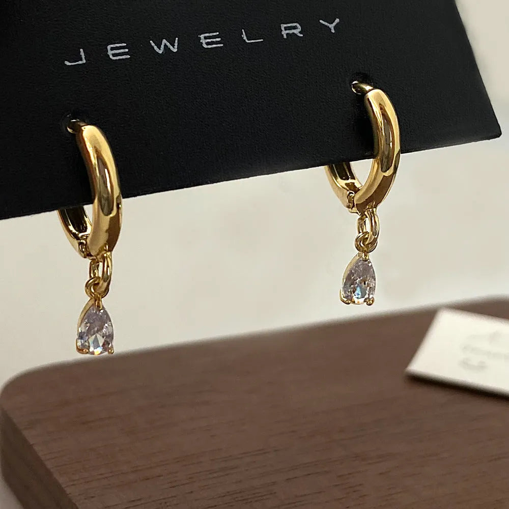 Women's zircon necklace set with matching geometric earrings and anklet featuring meteor shower pattern