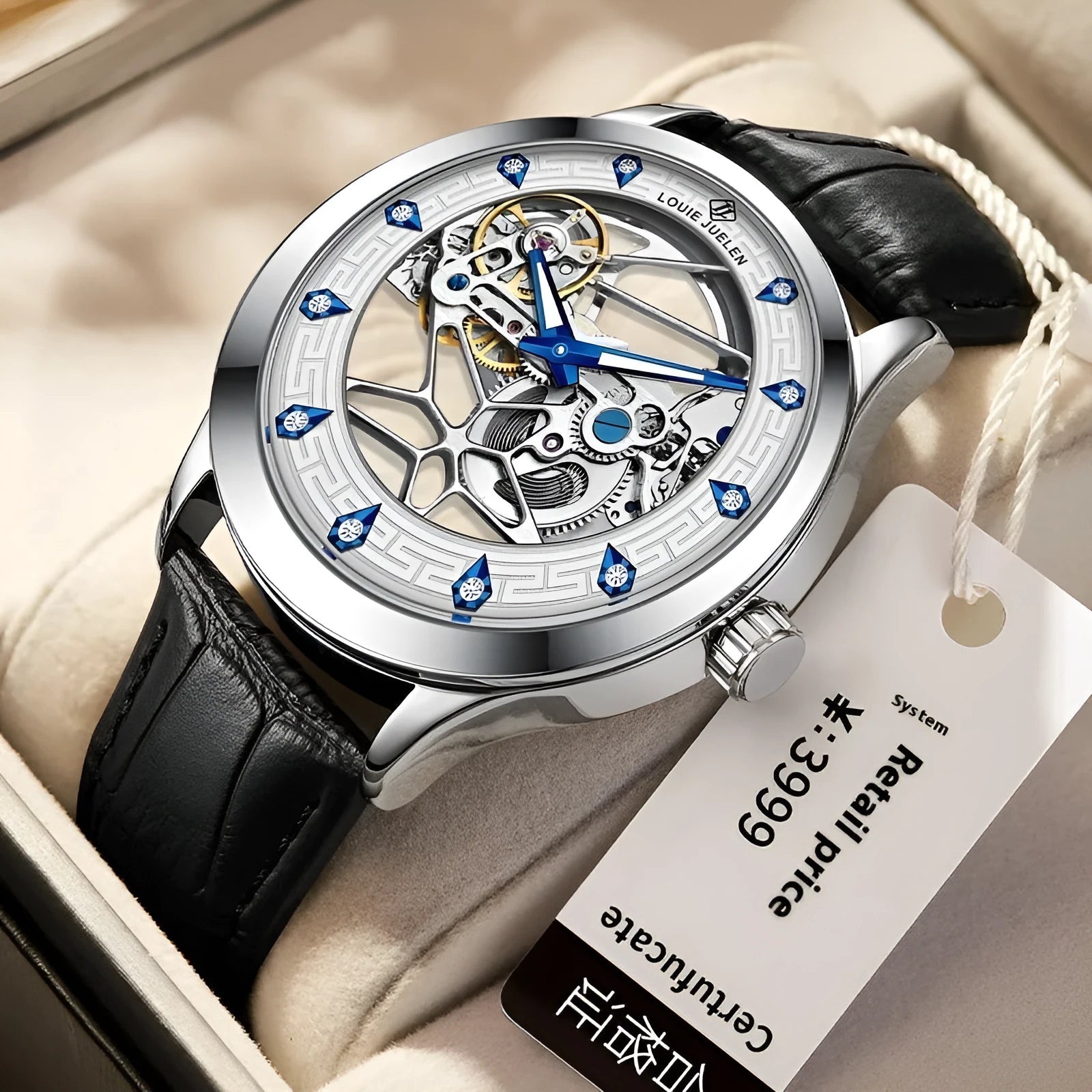 Men's silver mechanical watch with white dial, blue hands, black leather strap, and butterfly clasp.