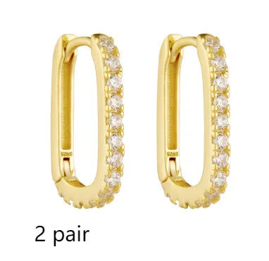 S925 sterling silver oval zircon ear clip earrings for women in yellow and white.