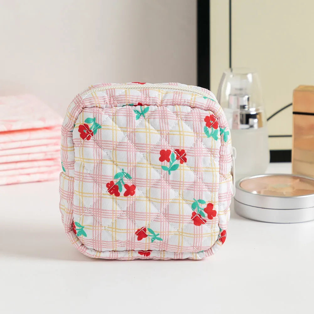 Breathable polyester key storage bag showing multiple floral and cherry pattern options including white background designs