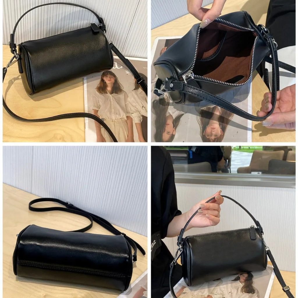Soft genuine leather cylindrical crossbody bag in street style, shown in black, with a single strap.