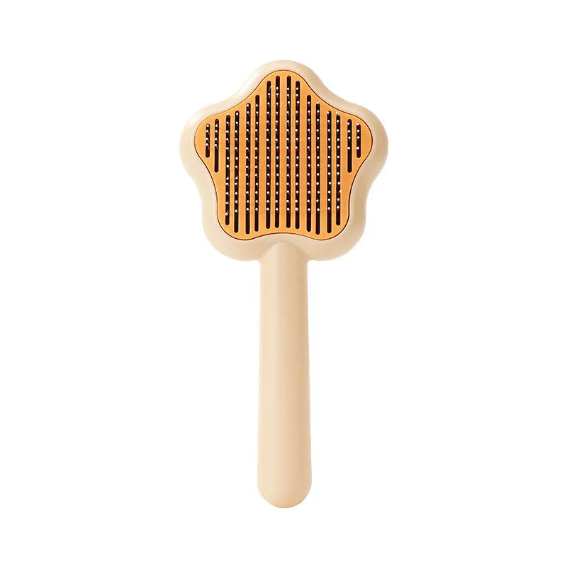 Self-cleaning stainless steel cat comb in green colour measuring 20cm long by 9.5cm wide