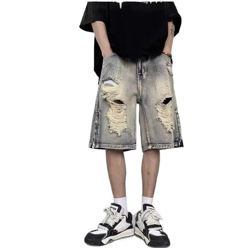 Blue wide-leg denim shorts with tattered retro styling and loose fit design