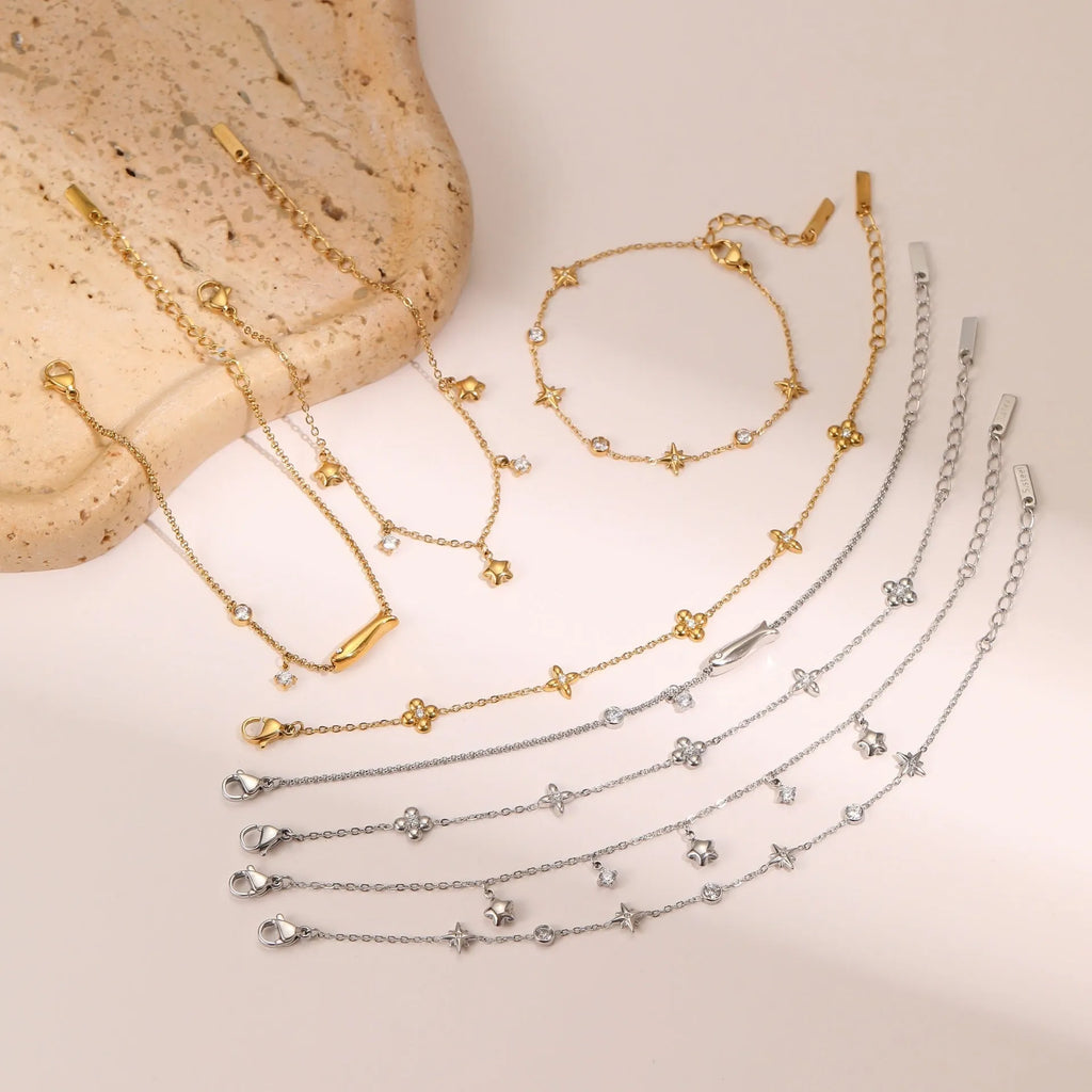 Ins Titanium Steel women's bracelet with 18K gold plating and a geometric zircon star pendant.
