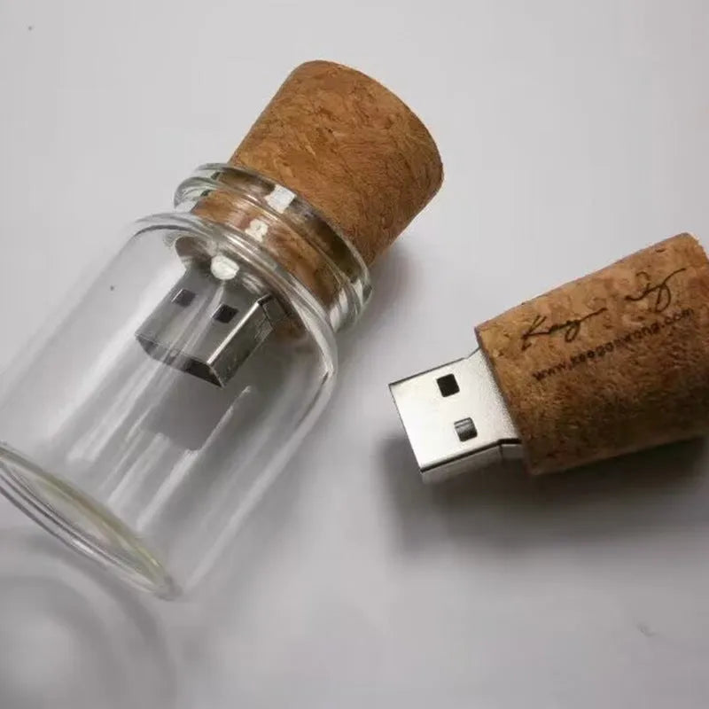 Clear glass drift bottle shaped USB flash drive with a wooden cork stopper, showing dimensions.