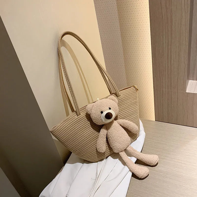 Cotton and linen woven shoulder bag with dumpling shape and double straps in multiple colours