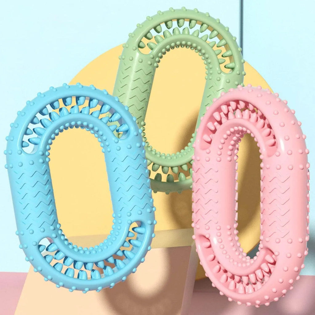 Blue, green, and pink O-ring shaped durable dog chew toy for aggressive chewers.