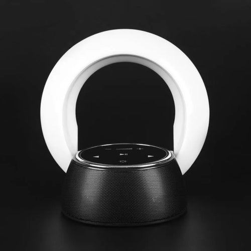 Blue Bluetooth speaker LED desk lamp with touch controls and folding design on wooden desktop