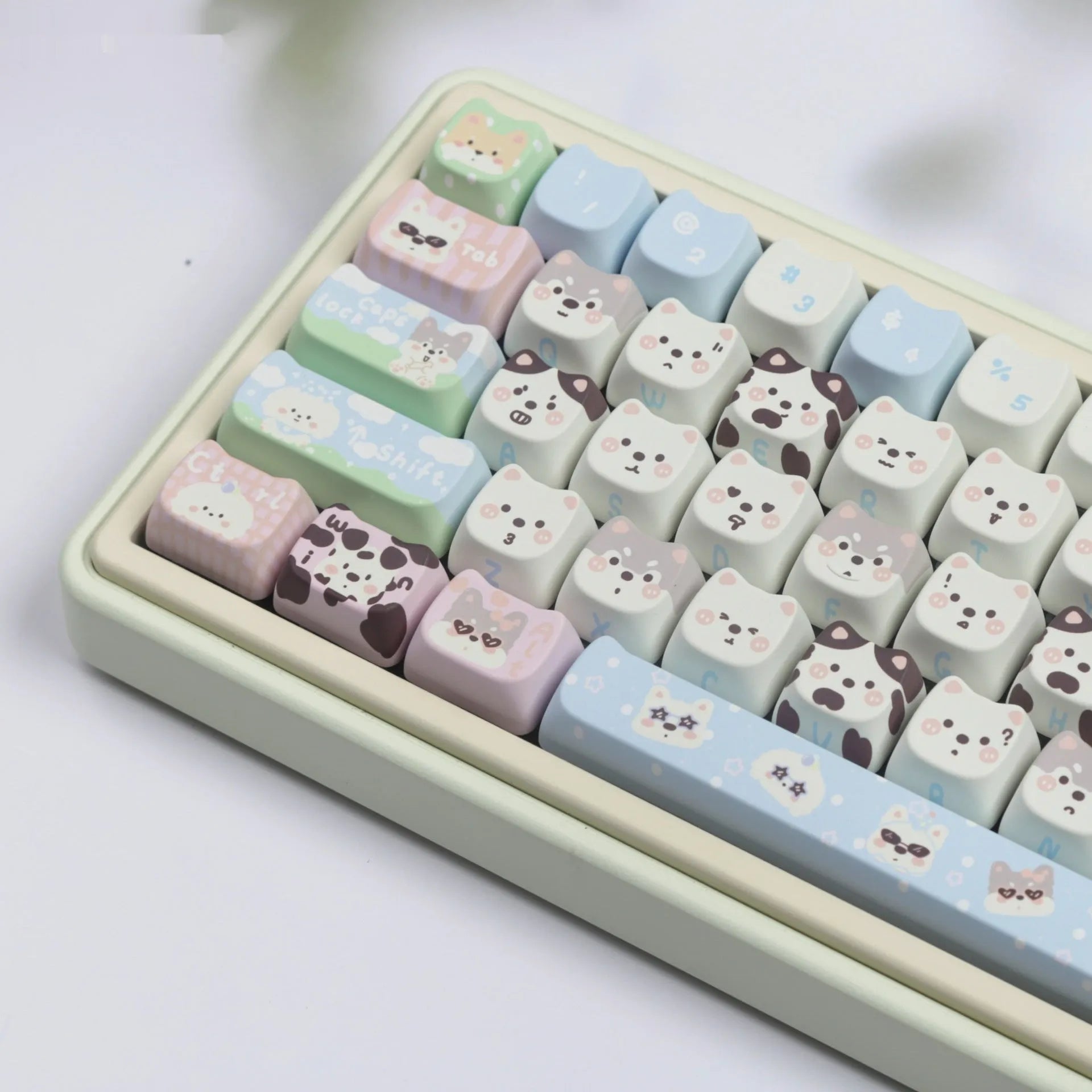 PBT sublimation key cap set showing colourful cat and puppy character designs on mechanical keyboard keys