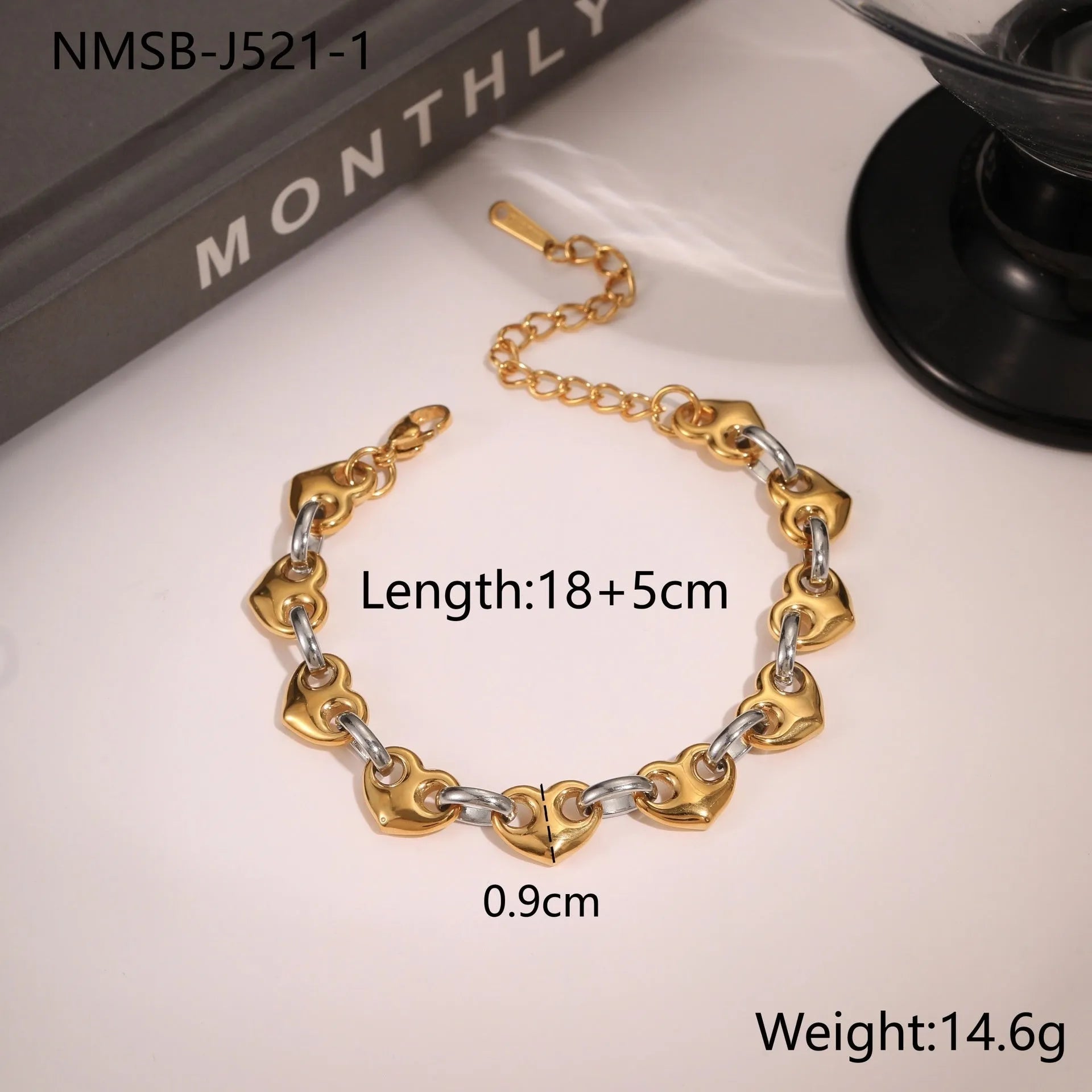 Hollowed-out heart bracelet in stainless steel with 18K gold plating showing simple geometric design