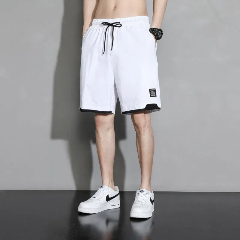 Boys' loose-fit cotton shorts in black, available in plus sizes for summer comfort.