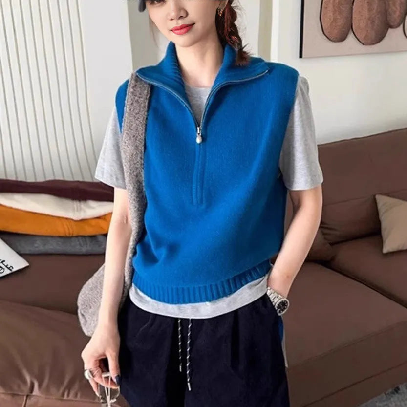 Retro half-zip sleeveless knit vest in mesh polyester fabric shown in a solid colour