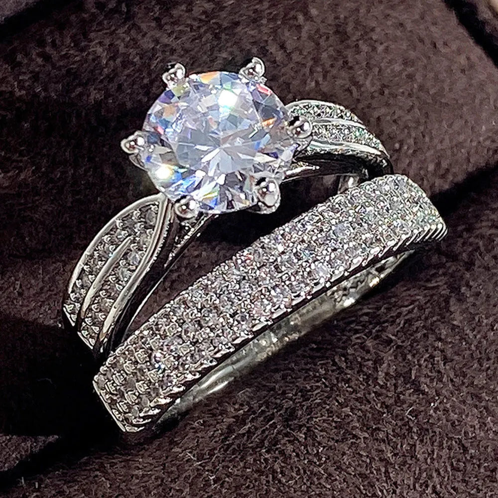 White gold colour combined ring and bracelet jewellery with geometric shape and round elements