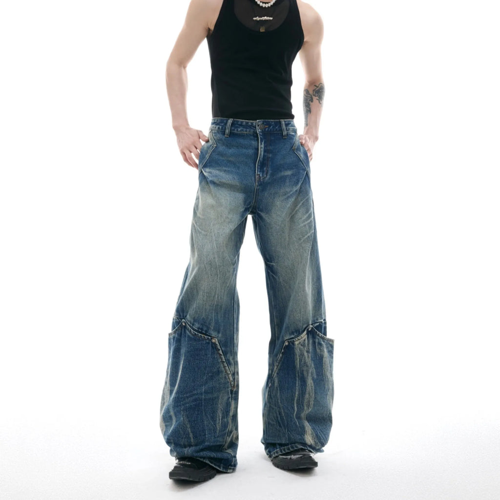 Men's verdant blue retro jeans with washed burst pattern, loose fit curved knife style