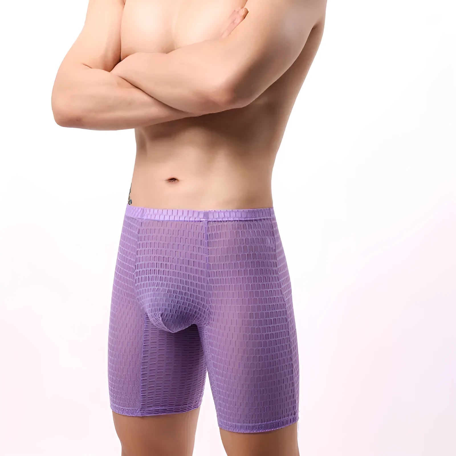 Men's white lace boxer shorts with a mid waist fit on a plain background.