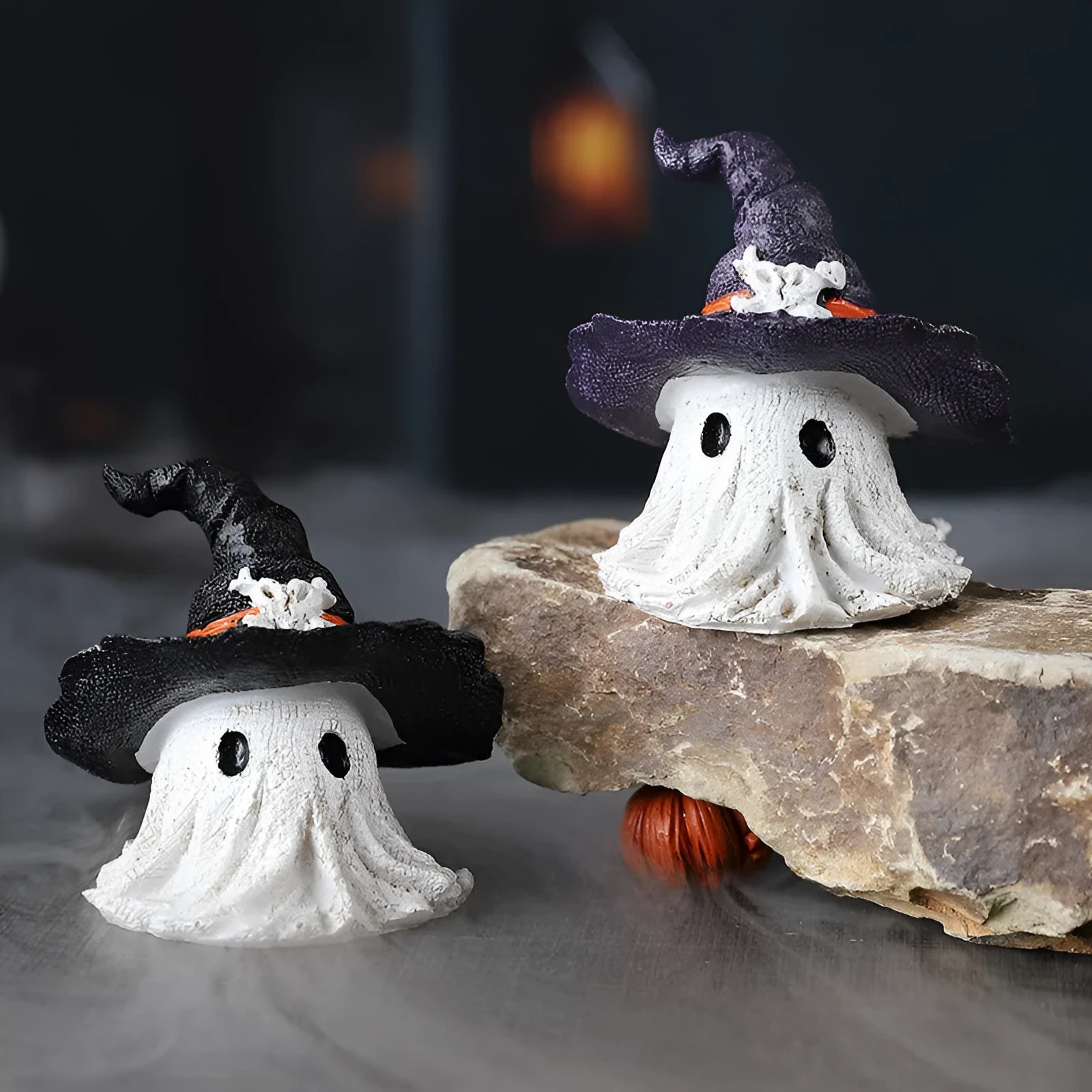Resin wizard hat ornament in child size, available in black or purple for holiday decorations
