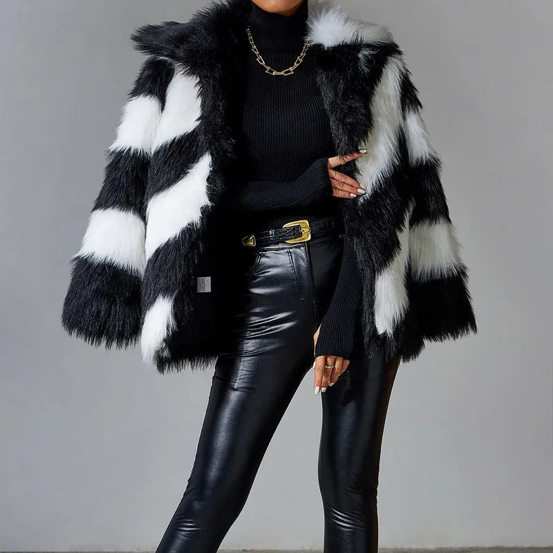 Women's faux fur coat with contrast lapel and fur collar in mid-length design