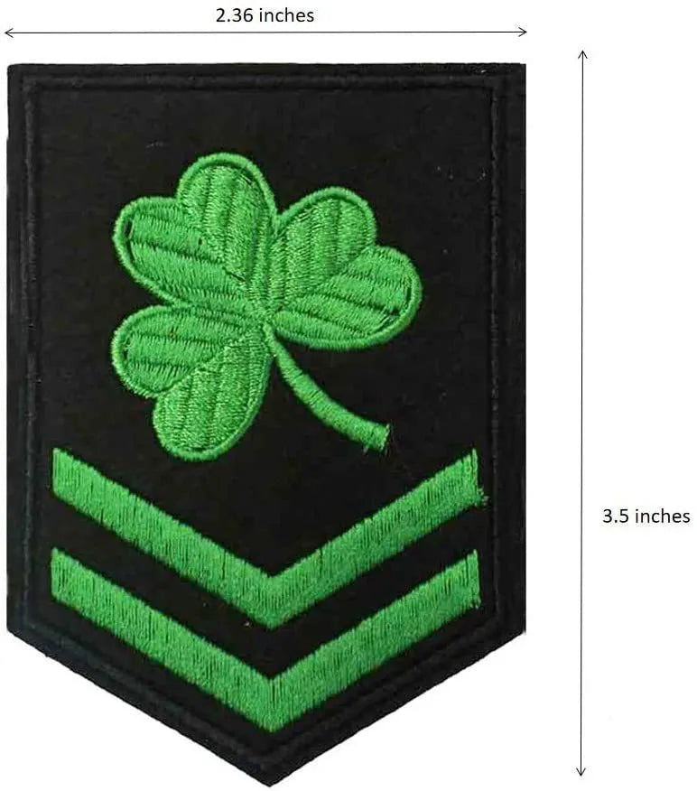 Outdoor embroidered fabric badge with Velcro strip backing on a green clover design.