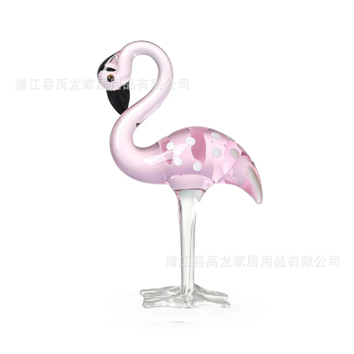 Pink crystal flamingo decorative sculpture on table with modern minimalist design