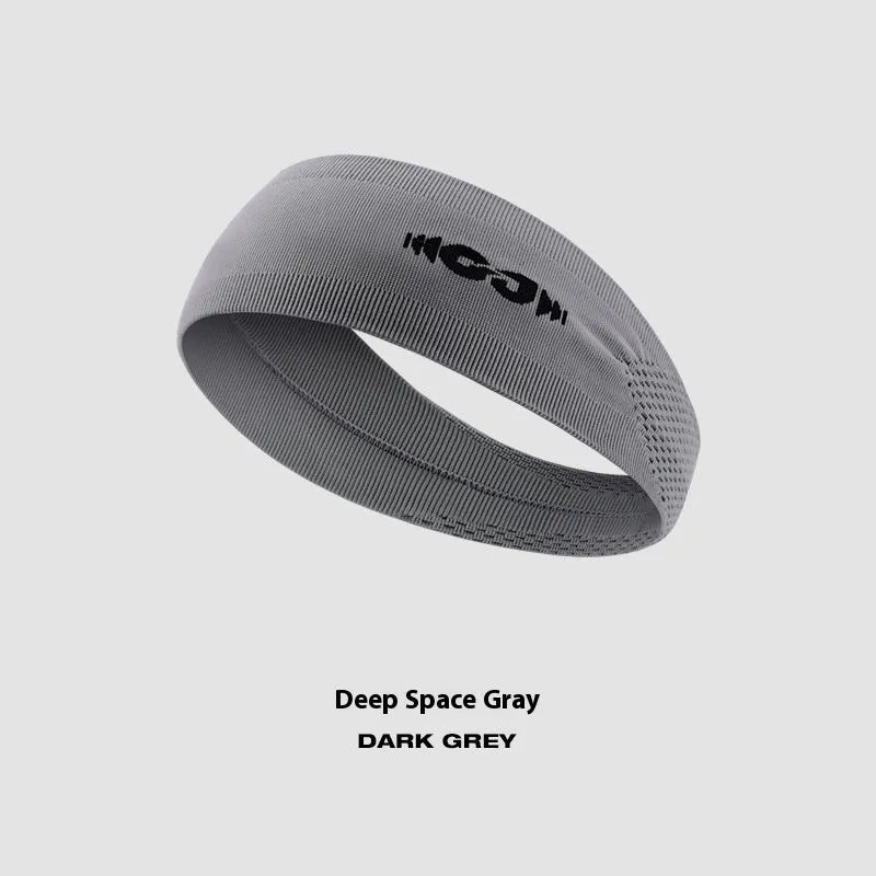Seamless knitted exercise hair band in classic black shown stretched slightly to demonstrate elasticity