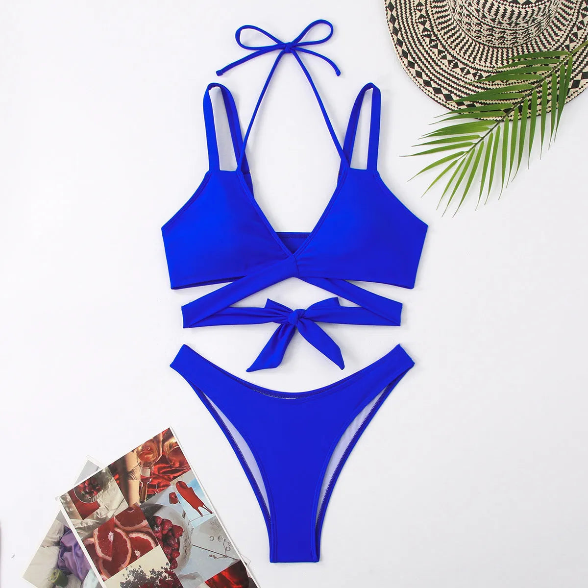 Women's solid colour bikini swimsuit on a hanger, showing adjustable straps and briefs style.