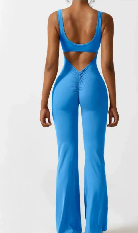 Women's black milk silk yoga bodysuit with seamless hollow design and mid-waist fit.