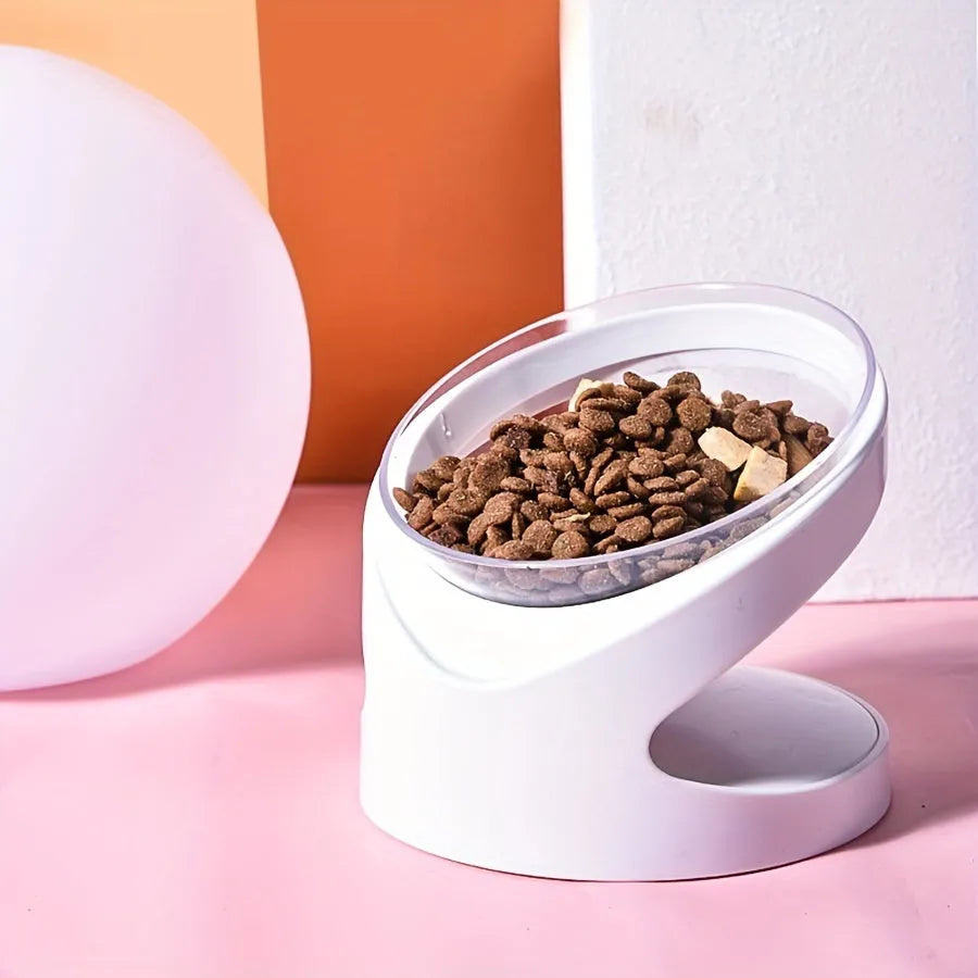 White clear plastic tilted ergonomic cat food bowl for dry and wet food.