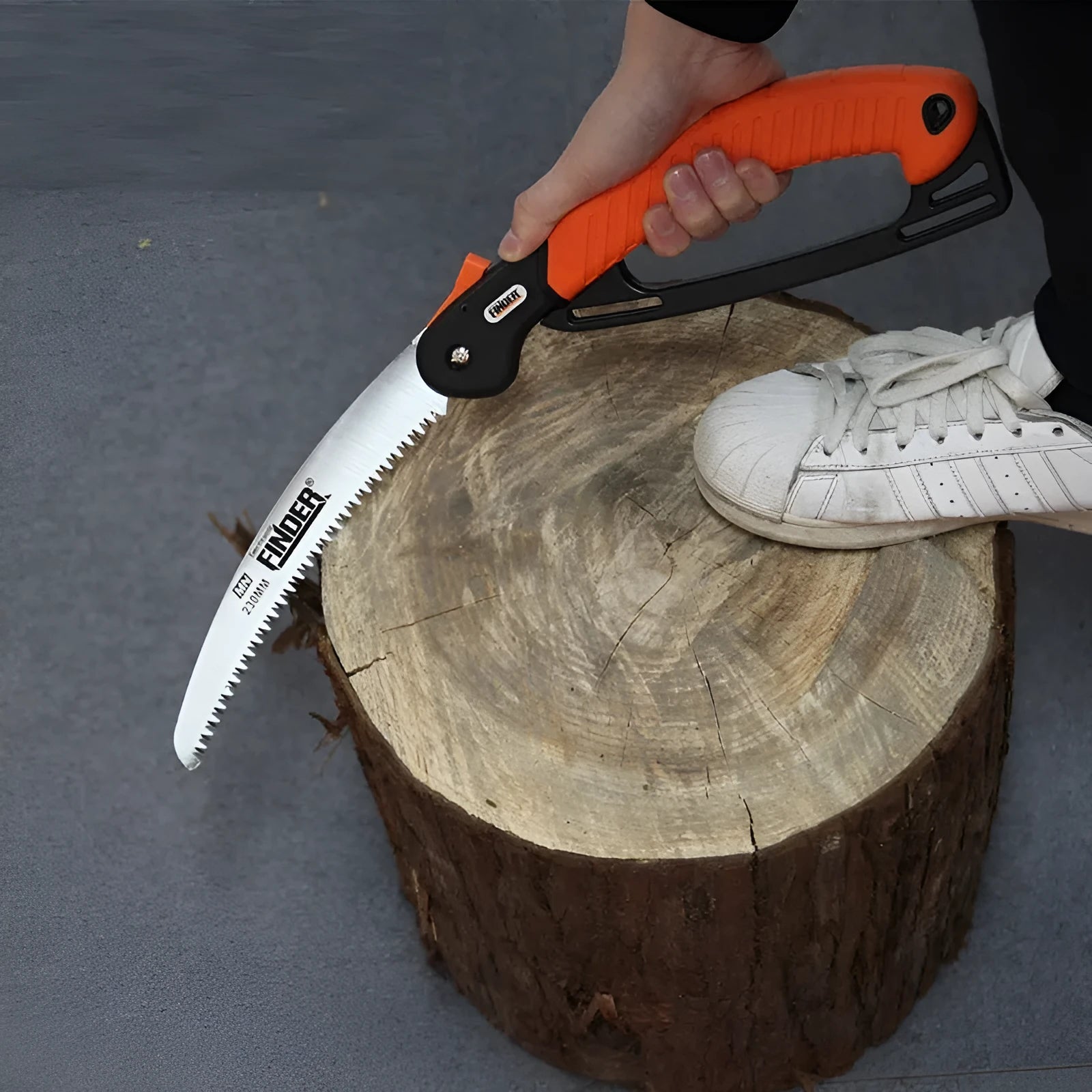 A folded and open 230mm garden trunk saw with a TPR grip and 65MN steel blade.